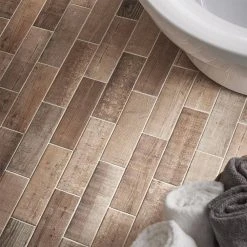 Teakwood Brown 4 in. x 12 in. Matte Porcelain Wall and Floor Tile (13.56 sq. ft./Case) by Jeffrey Court -Ivy Hill Tile Sales brown jeffrey court porcelain tile 98493 40 1000