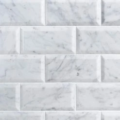 White Carrara Beveled 3 in. x 6 in. x 9mm Polished Marble Subway Tile (40 pieces / 5 sq. ft. / box) by Ivy Hill Tile